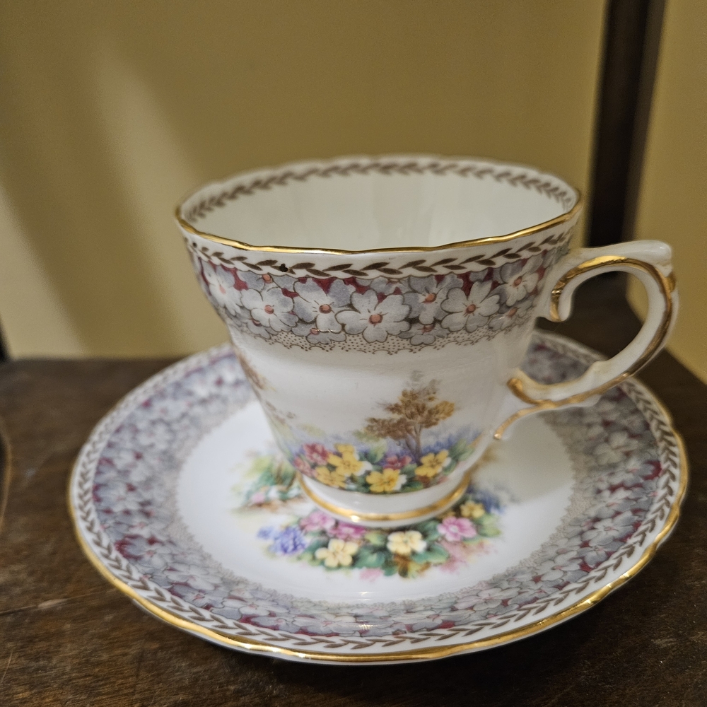 Vintage Floral Teacup and Saucer with Gold Trim